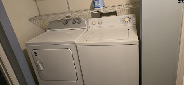 laundry room with separate washer and dryer