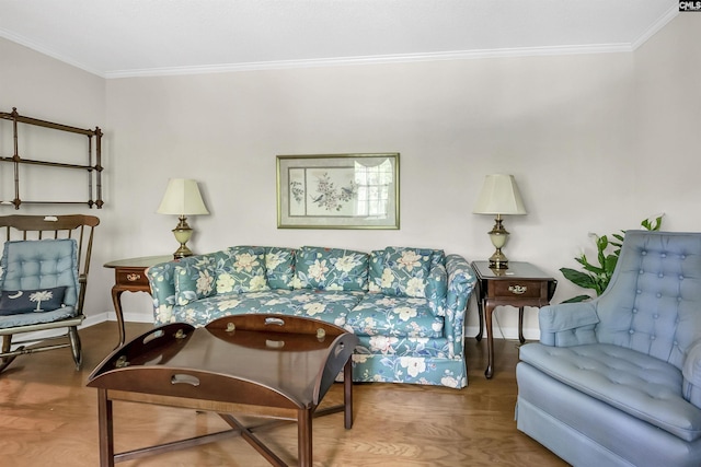 living area featuring ornamental molding, wood finished floors, and baseboards