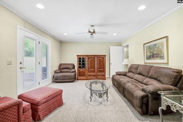 carpeted living area featuring crown molding, ceiling fan, and recessed lighting