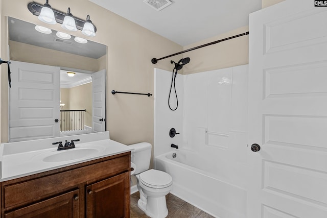 full bath featuring toilet, vanity, and shower / bath combination