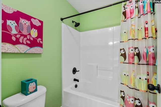 bathroom with toilet and shower / tub combo with curtain