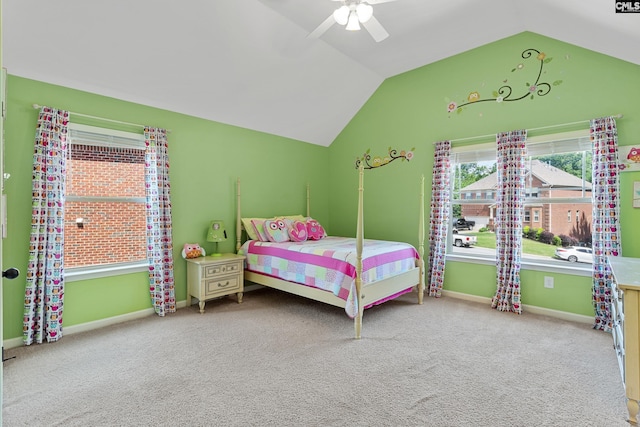 bedroom with vaulted ceiling, carpet floors, ceiling fan, and baseboards