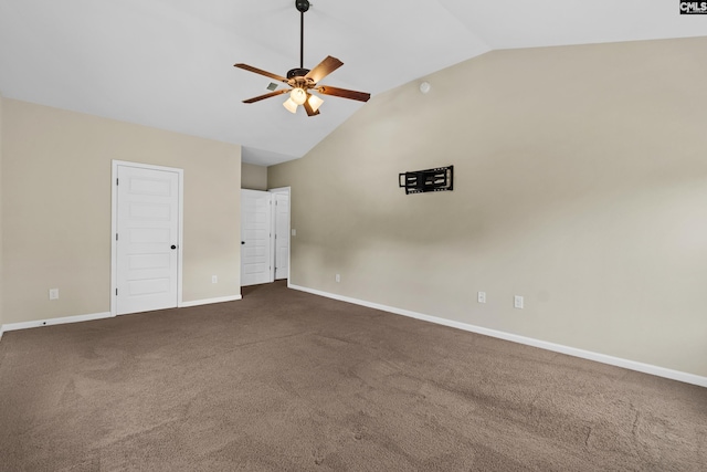 unfurnished room featuring a ceiling fan, baseboards, dark colored carpet, and high vaulted ceiling