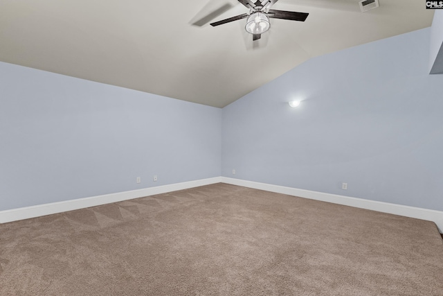 bonus room featuring ceiling fan, lofted ceiling, carpet, and baseboards