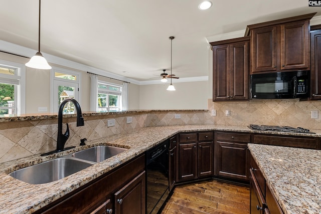 kitchen with black appliances, a sink, a ceiling fan, dark wood-style floors, and dark brown cabinets
