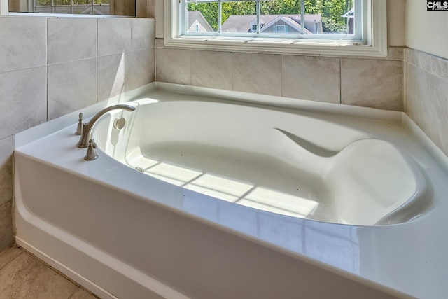 bathroom featuring a bath