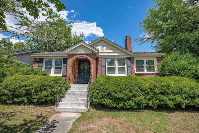 3803 Yale Ave, Columbia, SC 29205 - view of front of home with brick siding and a chimney