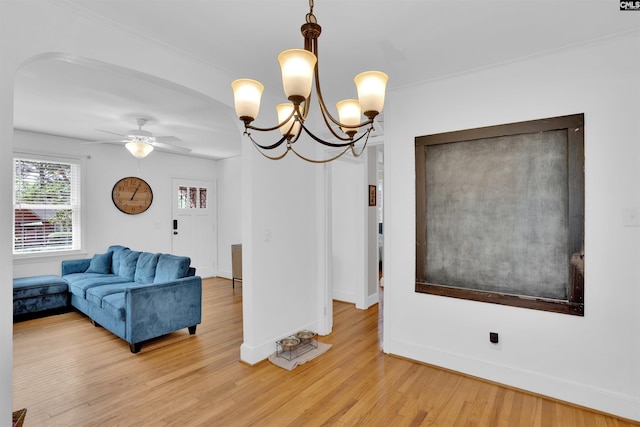 3803 Yale Ave, Columbia, SC 29205 - living area featuring baseboards, light wood-style flooring, a chandelier, and ceiling fan
