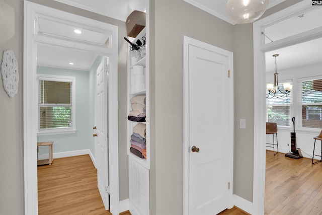 3803 Yale Ave, Columbia, SC 29205 - corridor featuring light wood-style floors, ornamental molding, baseboards, a chandelier, and recessed lighting