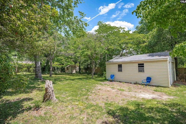 3803 Yale Ave, Columbia, SC 29205 - view of green lawn featuring a storage shed and an outdoor structure
