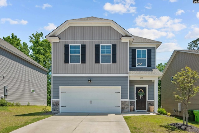 255 Honey Hill Way, Blythewood, SC 29016 - craftsman-style home featuring stone siding, an attached garage, driveway, a shingled roof, and a front yard