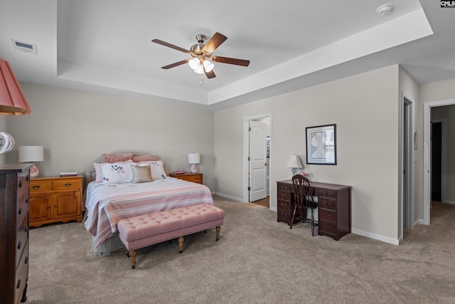 255 Honey Hill Way, Blythewood, SC 29016 - carpeted bedroom featuring a tray ceiling, baseboards, and ceiling fan