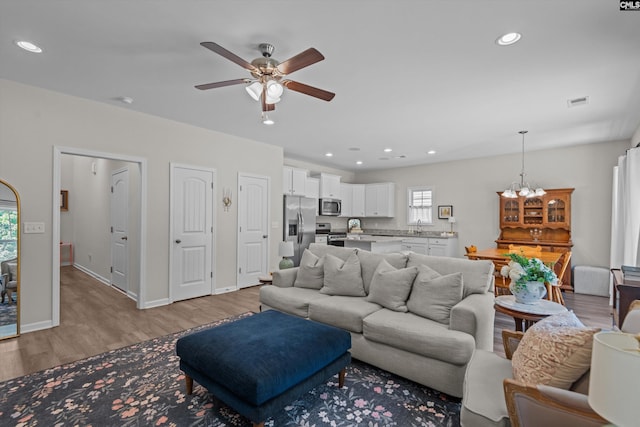 255 Honey Hill Way, Blythewood, SC 29016 - living area with ceiling fan, light wood-style flooring, recessed lighting, a chandelier, and baseboards