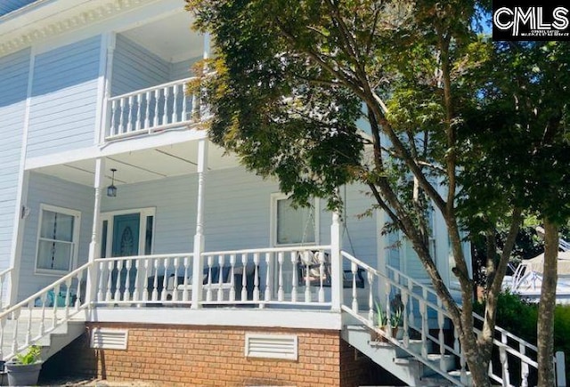319 Mooring Ln, Lexington, SC 29072 - view of side of property featuring stairway, covered porch, and a balcony