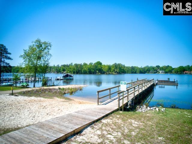 319 Mooring Ln, Lexington, SC 29072 - dock featuring a boat ramp and a water view