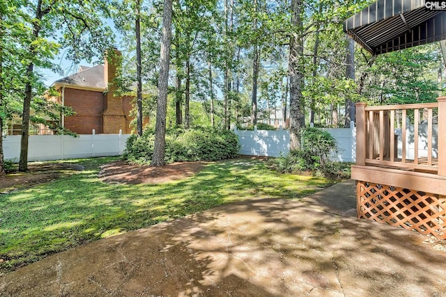 view of yard with a patio and a deck