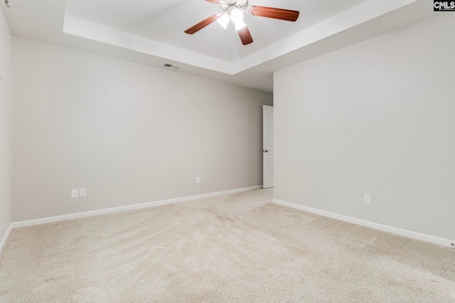146 Sabal Dr, West Columbia, SC 29169 - carpeted spare room with a raised ceiling, baseboards, and ceiling fan