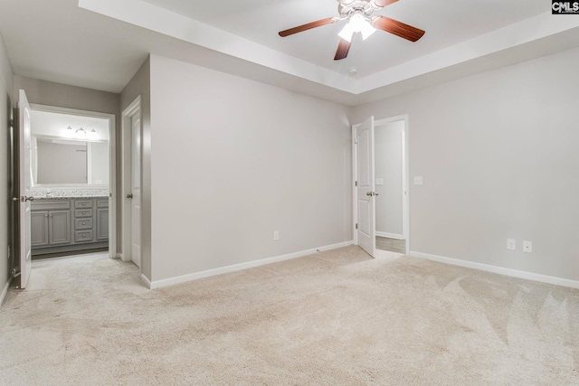 146 Sabal Dr, West Columbia, SC 29169 - unfurnished bedroom featuring light colored carpet, baseboards, ensuite bathroom, and a ceiling fan