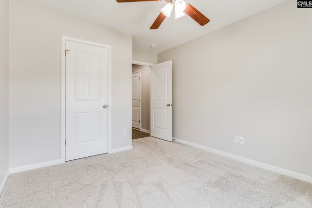 146 Sabal Dr, West Columbia, SC 29169 - unfurnished bedroom featuring carpet flooring, baseboards, and a ceiling fan