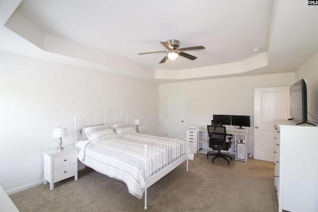 333 Oristo Ridge Way W, Columbia, SC 29170 - bedroom with light colored carpet, a tray ceiling, a desk, and ceiling fan