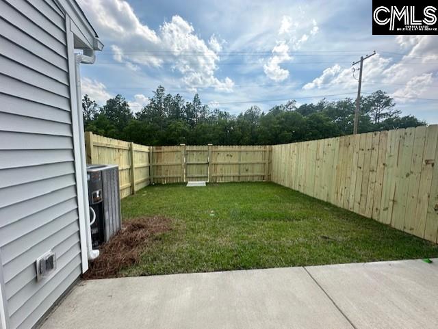 2040 Skyline Rd, Columbia, SC 29229 - view of yard featuring central air condition unit and a patio area