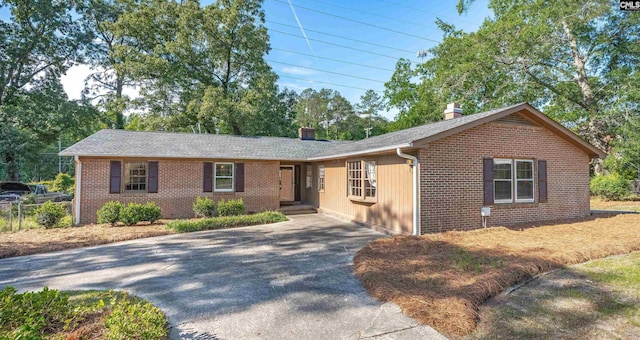 604 Shady Ln, Cayce, SC 29033 - single story home featuring a chimney, brick siding, asphalt driveway, and roof with shingles