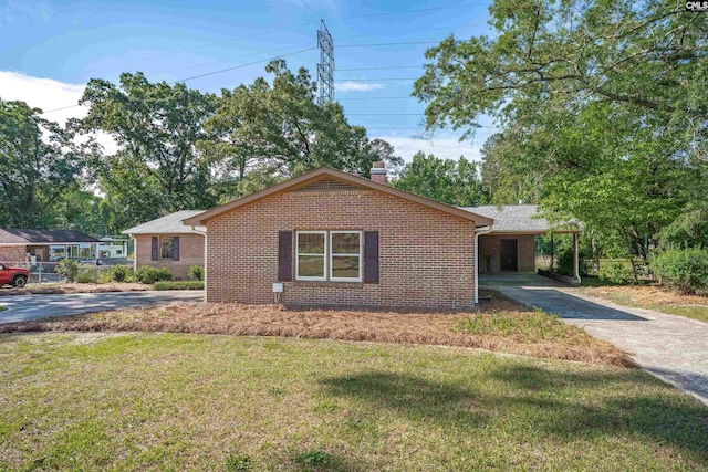 604 Shady Ln, Cayce, SC 29033 - single story home featuring driveway, brick siding, a front yard, and a carport