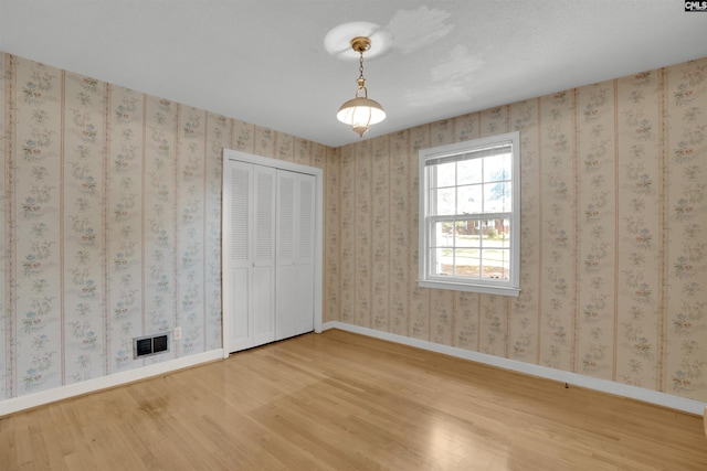 604 Shady Ln, Cayce, SC 29033 - spare room with wood finished floors and baseboards