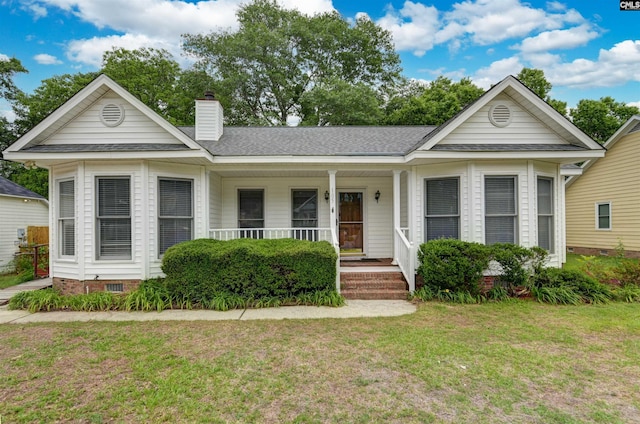 105 Golden Pond Dr, Lexington, SC 29073 - view of front of home featuring crawl space, a front yard, a porch, a chimney, and a shingled roof