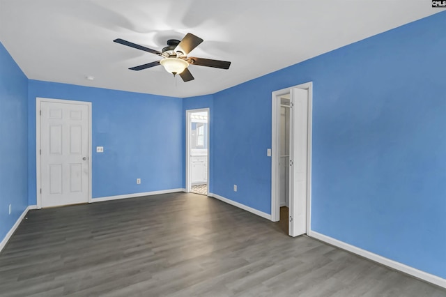 105 Golden Pond Dr, Lexington, SC 29073 - unfurnished bedroom featuring baseboards, wood finished floors, and ceiling fan