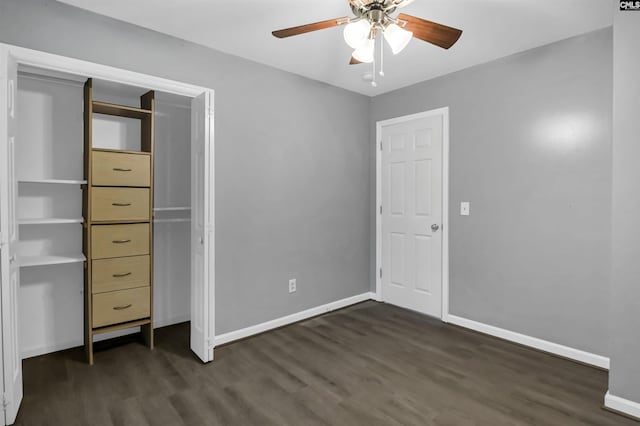 105 Golden Pond Dr, Lexington, SC 29073 - unfurnished bedroom with dark wood-type flooring, baseboards, and a ceiling fan