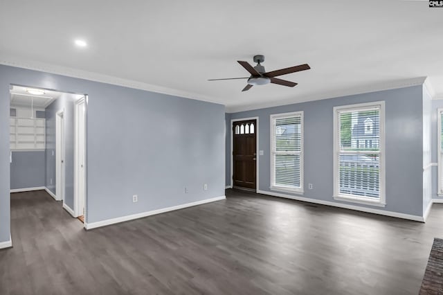 105 Golden Pond Dr, Lexington, SC 29073 - empty room with ceiling fan, ornamental molding, dark wood-style flooring, baseboards, and attic access