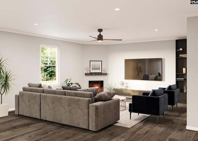 208 Long Iron Ct, West Columbia, SC 29172 - living area featuring ornamental molding, dark wood-style flooring, a warm lit fireplace, recessed lighting, and ceiling fan