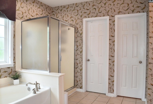 5102 Circle Dr, Columbia, SC 29206 - full bath with wallpapered walls, tile patterned floors, a shower stall, and a bath