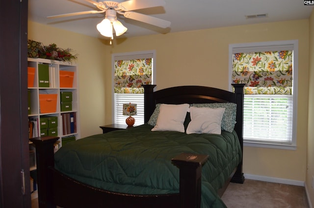 5102 Circle Dr, Columbia, SC 29206 - bedroom with carpet floors, baseboards, and ceiling fan