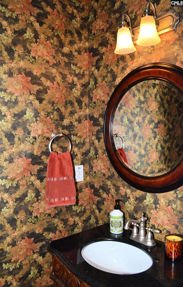 5102 Circle Dr, Columbia, SC 29206 - bathroom with wallpapered walls and vanity