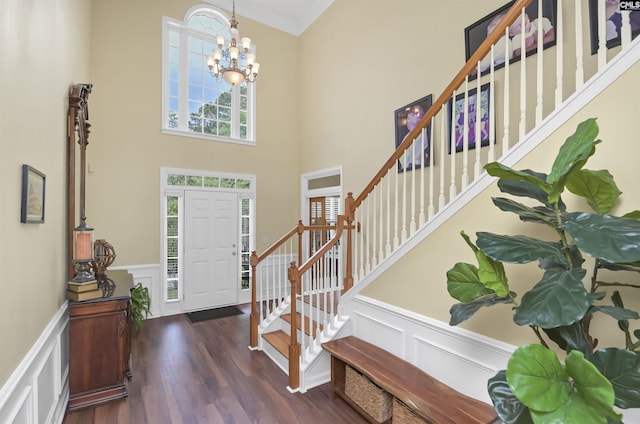 5102 Circle Dr, Columbia, SC 29206 - entrance foyer featuring stairs, a chandelier, a decorative wall, wood finished floors, and a wainscoted wall