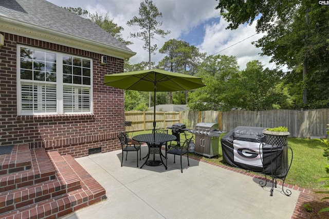 5102 Circle Dr, Columbia, SC 29206 - view of patio / terrace featuring outdoor dining area, fence, and grilling area