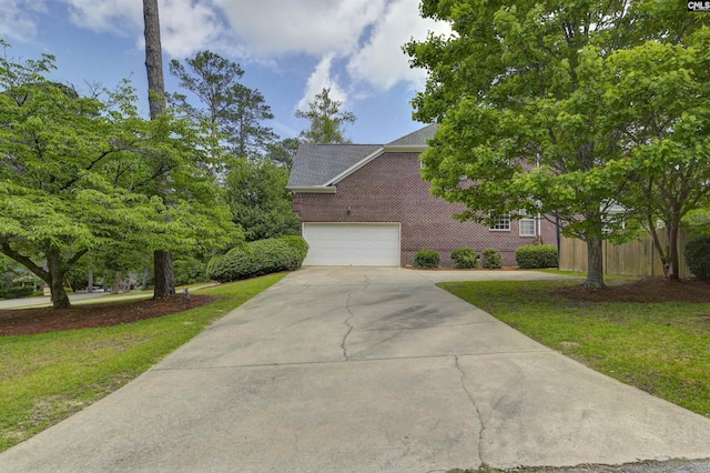 5102 Circle Dr, Columbia, SC 29206 - view of front of home with concrete driveway, a front lawn, and a garage