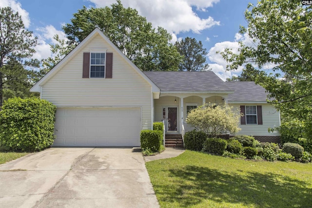 409 Waterville Dr, Columbia, SC 29229 - traditional home featuring driveway, a front yard, covered porch, and a shingled roof