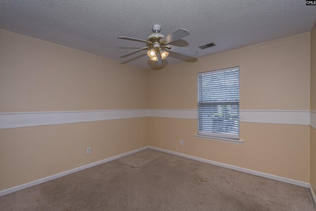 409 Waterville Dr, Columbia, SC 29229 - carpeted empty room featuring ceiling fan, baseboards, and a textured ceiling