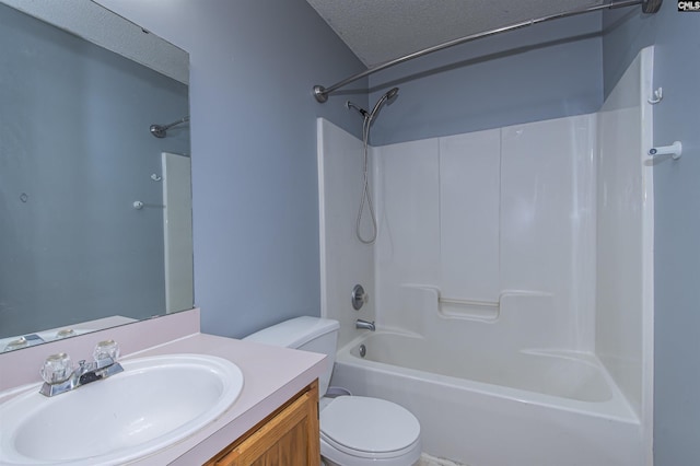 full bath featuring toilet, vanity, shower / tub combination, and a textured ceiling