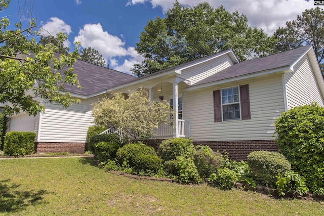 409 Waterville Dr, Columbia, SC 29229 - ranch-style house with a front lawn, a porch, and a shingled roof
