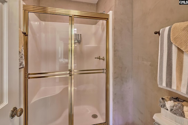 bathroom featuring a shower stall