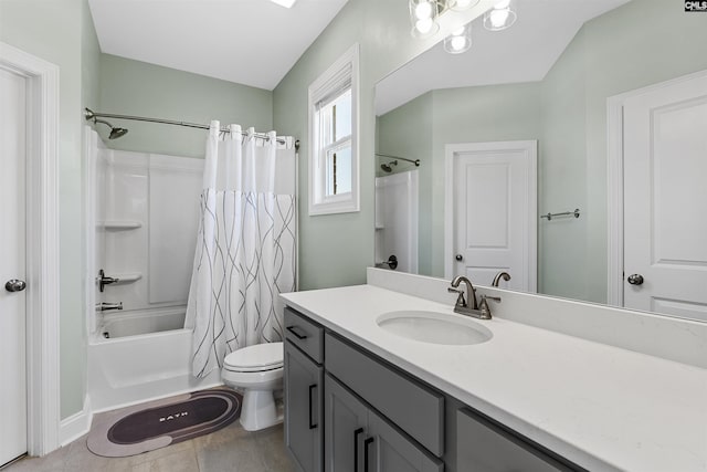 bathroom featuring vanity, toilet, and shower / bath combination with curtain