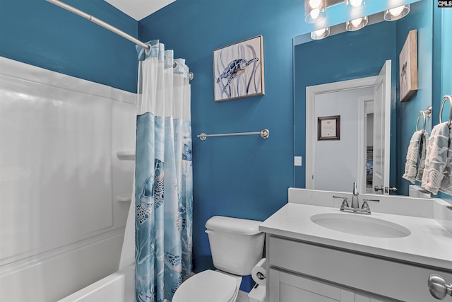 full bathroom featuring toilet, vanity, and shower / bath combination with curtain