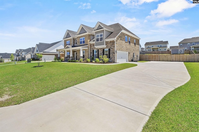 craftsman-style home with stone siding, concrete driveway, a residential view, and an attached garage