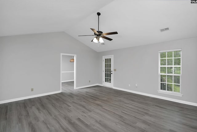 unfurnished room featuring a ceiling fan, dark wood-style flooring, lofted ceiling, and baseboards