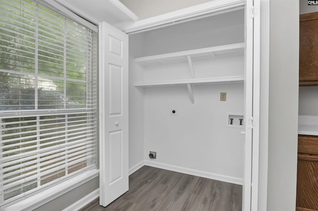 washroom featuring hookup for an electric dryer, hookup for a washing machine, dark wood-style flooring, and baseboards