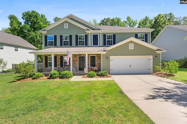 view of front facade with a garage, a porch, driveway, and a front lawn